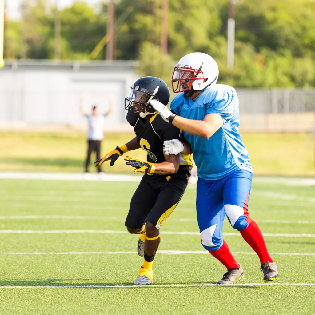 Football players representing athletic recovery and performance