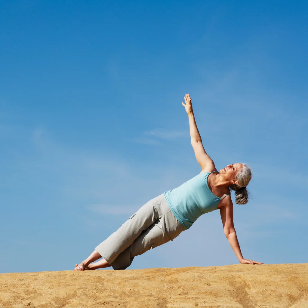 Person doing yoga, representing pain-free movement
